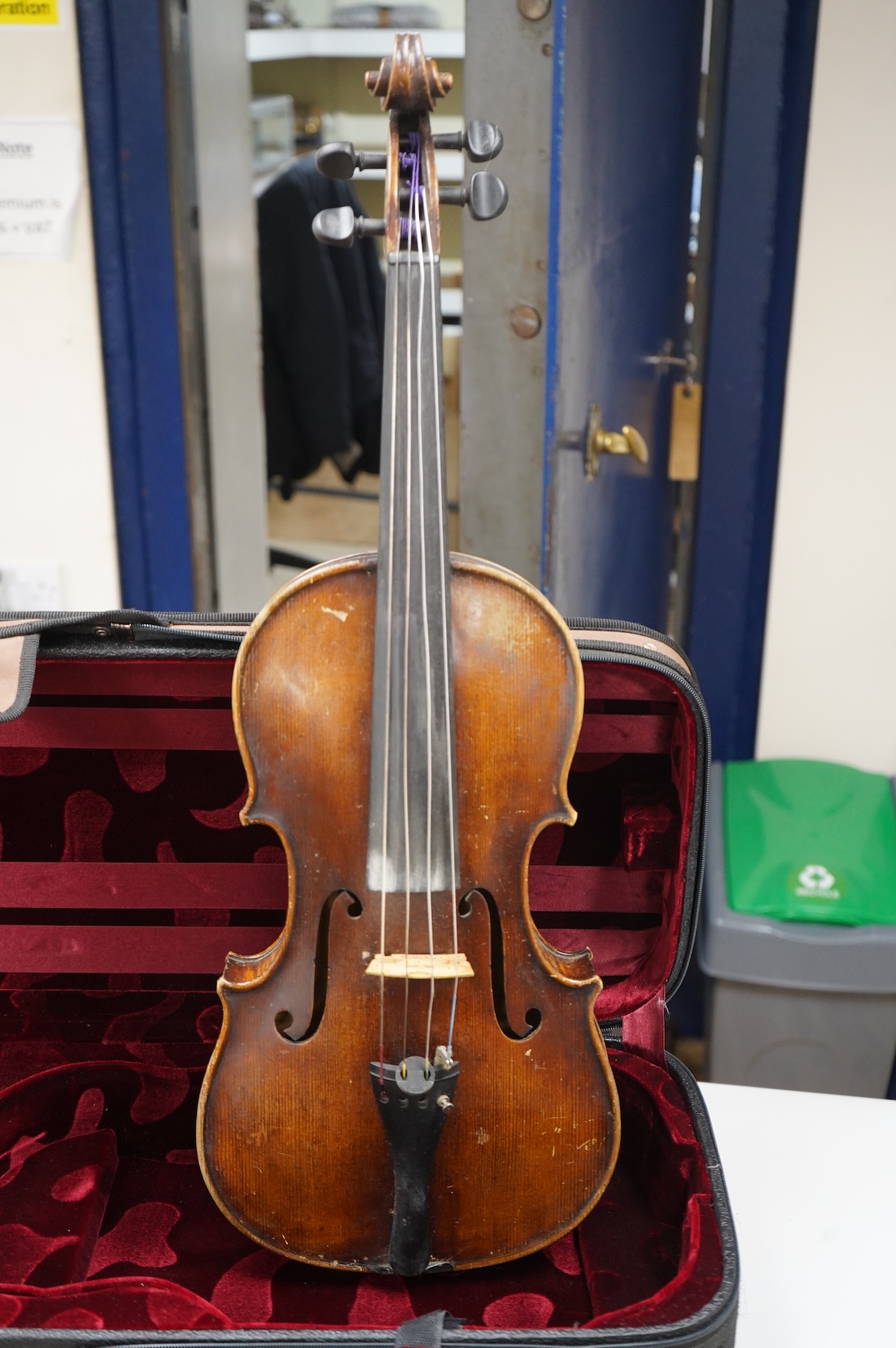 A cased late 19th century German viola, the body 15 3/4”, bearing a label reading Max Lutz 1939